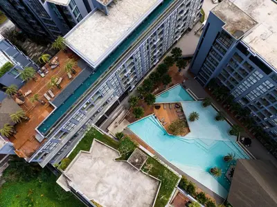 an overhead view of a swimming pool in a building at C255 Best Stay Experience Condo with Full Facilities in Kamala Beach