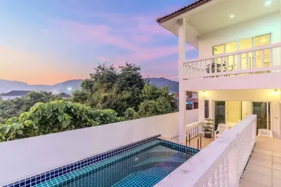 a house with a swimming pool and a balcony at V274 Prime Location Large Terrace Pool View BBQ in Ban Saiyuan (1)