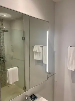 a bathroom with a glass shower and a sink at Diamond Resort 1 Bdr Bang Tao in Bang Tao Beach