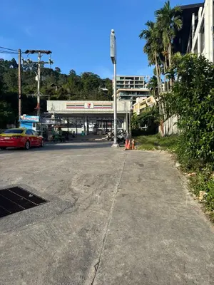 an empty street in front of a gas station at 3 Beds patong baycleef residence in Patong Beach