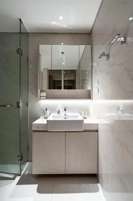 a bathroom with a sink and a mirror and a shower at 1Bdr in Cassia Residence Laguna in Laguna Phuket
