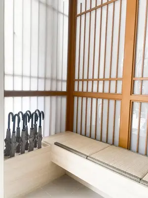 a room with a row of knives sitting next to a window at Tatami Hotel Phuket in Ban Ket Ho