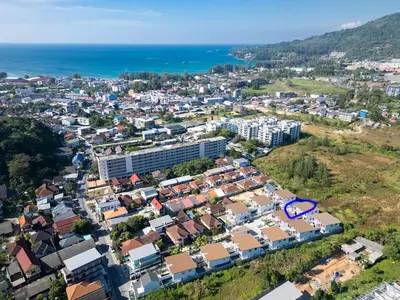 an aerial view of a city with houses and the ocean at Lelux Villa Kamala - Goldena Twin in Kamala Beach