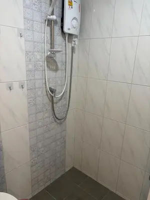 a shower stall in a bathroom with a shower at Apartment in Patong Beach in Patong Beach
