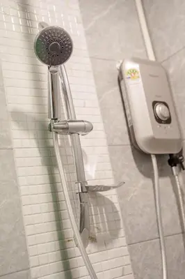 a shower in a bathroom with a shower head at B201 Banjong Studio 3 Minutes To Nai Harn Beach in Rawai Beach