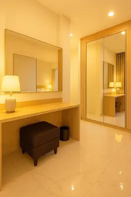 a bathroom with a large mirror and a stool at Zen Hilltop Nature Sanctuary Kamala Beach in Kamala Beach