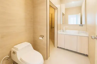 a bathroom with a toilet and a sink at Zen Hilltop Nature Sanctuary Kamala Beach in Kamala Beach