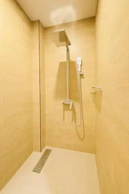 a shower with a glass door in a bathroom at Zen Hilltop Nature Sanctuary Kamala Beach in Kamala Beach