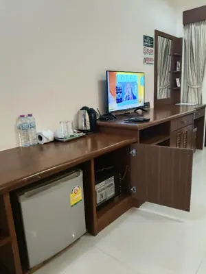 a desk with a computer on top of it at Patong \u4e00\u5367\u4e09\u4eba\u95f4 in Patong Beach