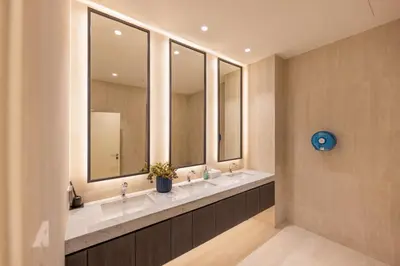 a bathroom with a row of sinks and mirrors at Evora 1BR Suite — The Title Legendary BangTao in Bang Tao Beach
