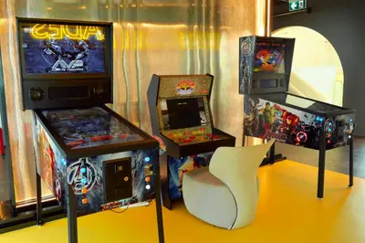 two arcade games and a video game console at The Title Legendary by TVC company in Bang Tao Beach