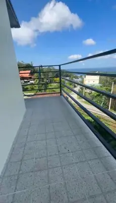 a balcony with a view of the ocean at Patong View by Thainish Res - Accommodation for Rentals in Ban Na Nai