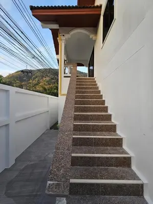 a stairway leading up to a house at Kamala House in Kamala Beach