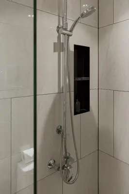 a shower with a glass door in a bathroom at Brand New 2-BR apartment, only 7 min to the beach! in Bang Tao Beach