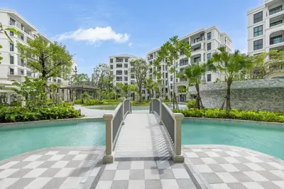 an image of a walkway in a apartment complex at Delos 1BR Suite — The Title Legendary BangTao in Bang Tao Beach