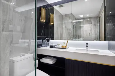 a bathroom with a white sink and a mirror at Bellevue Lagoon by My Home Phuket in Laguna Phuket