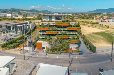 an aerial view of a city with buildings and a street at Condo Close to the Beach and City Center in Laguna Phuket
