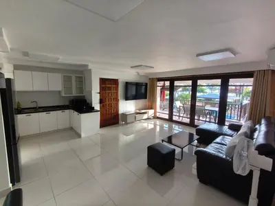 a large living room with a couch and a kitchen at Seaview paradise in Patong Beach