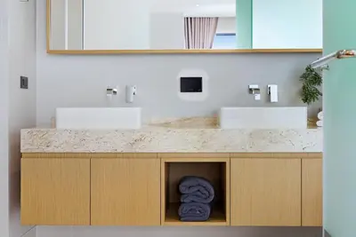 a bathroom with a sink and two sinks at Botanica Pru Jampa by Beringela in Phuket