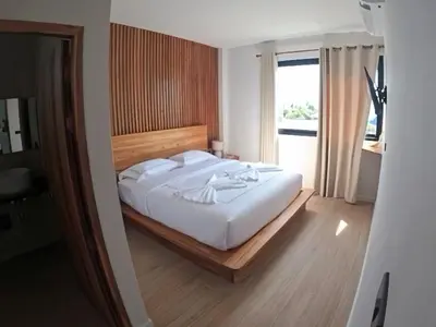 a bedroom with a large white bed and a window at Rawai 2 Bedrooms Private Pool Villa in Ban Saiyuan (1)