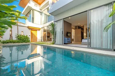 a swimming pool in front of a house at V217 Brand New 3BR Villa Near Beach & Boat Avenue in Thalang