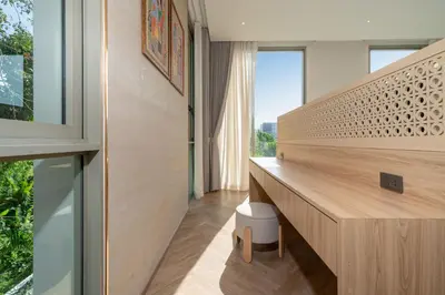 a room with a wooden desk and a window at Duplex 5 & 4 BR Private Pool Villa - Laguna Phuket in Laguna Phuket