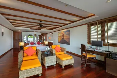 a living room with a couch and a bed and a desk at Stunning Sea & Sunset Views Villa over Patong Bay in Patong Beach