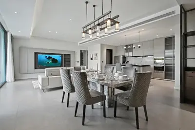a dining room and kitchen with a table and chairs at C32 Clover Residence Villa Phuket 3 bd in Ban Thalat Choeng Thale