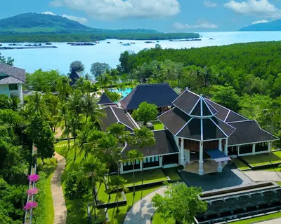 an aerial view of a house with trees and water at BB Luxury Villa in Phuket Town
