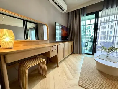 a bathroom with a tub and a sink and a mirror at The Title Legendary Bang-Tao Garden Harmony I-406 in Bang Tao Beach
