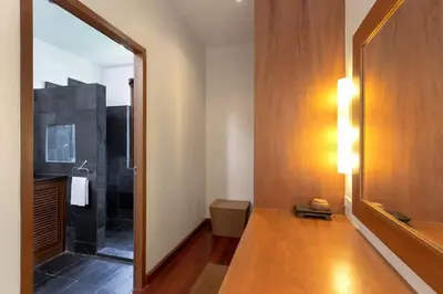 a bathroom with a mirror and a walk in shower at Villa Barron - Spacious Luxury Family Holiday Home in Chalong
