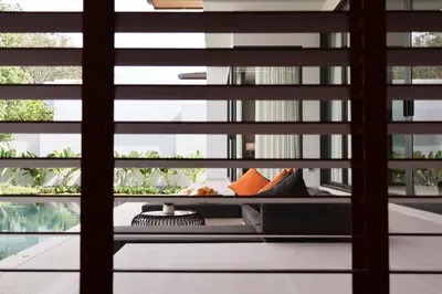 a room with a window with blinds at Botanica - Bali Style Luxury 3 BR Private Pool Villa in Ban Pak Lak