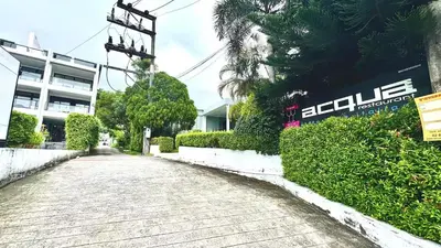 an empty street in front of a building at Comfort SeaView Apartment with Private Plunge Pool in Patong Beach