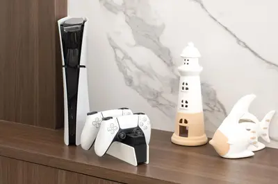 a shelf with a lighthouse and other items on it at Prestige 4BR Private Pool Residence in Rawai in Ban Kata