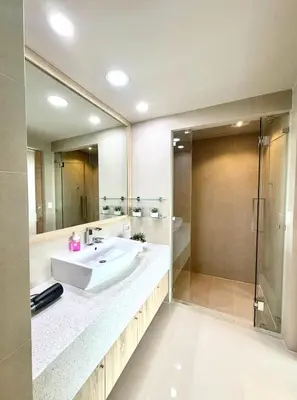 a large bathroom with a sink and a shower at Family apartment 2-BR with Sea View - Karon Beach in Ban Karon