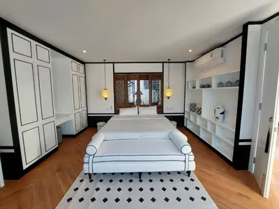 a bedroom with a large bed in a room at Seaview Swimming pool Villa118-1 in Ban Ao Makham