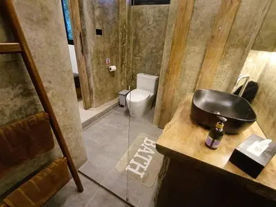 a bathroom with a sink and a toilet at Studio in Phuket Nai Harn in Rawai Beach