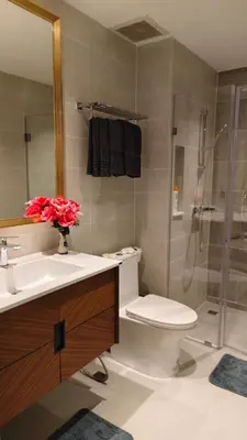 a bathroom with a toilet and a sink and a shower at Luxury 2 Person Apartment in Heart of Phuket 2 in Ban Ket Ho