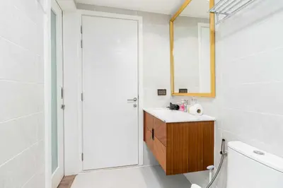 a bathroom with a sink and a mirror at C261 Work Play & Stay City 1BR Condo Poo l& Gym in Kathu