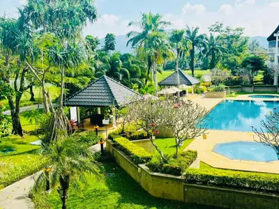 an aerial view of a resort with a swimming pool at Allamanda 2 lake side pad in the heart of Laguna in Laguna Phuket