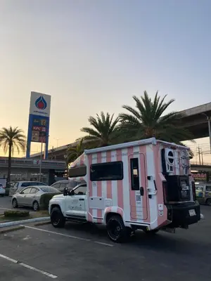 a food truck is parked in a parking lot at CoconutRoads Self Drive Motorhome in Phuket
