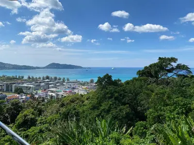 a view of a city and the ocean at Andaman hill pool Seaview three bedroom in Patong Beach
