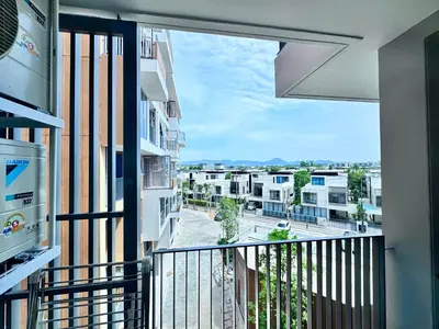 an apartment balcony with a view of a street at Skypark New Building 4th floor Mountain View in Laguna Phuket