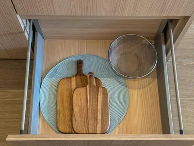 two wooden cutting boards and a bowl in a drawer at Great Apartment Sea Heaven 2 min to Nai Thon Beach in Nai Thon Beach