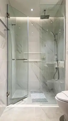 a shower with a glass door in a bathroom at The AQUA A202 in Bang Tao Beach