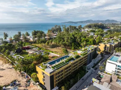 an aerial view of a city and the ocean at Laguna Beach Residences Seashore by Banyan Living in Phuket