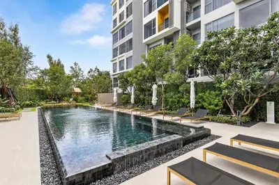 an image of a swimming pool in a building at Laguna LakeSide Residences by My Home Phuket in Bang Tao Beach