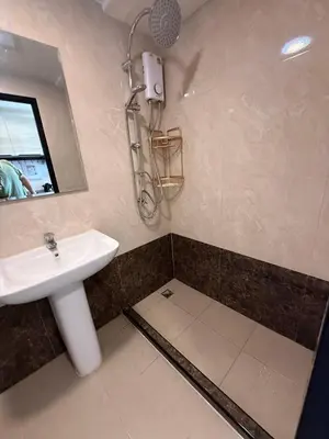 a bathroom with a sink and a shower at FAMILY HOMES Mai Khao Poolside Studio CB-845 Near Sirinat Park in Ban Mai Salae