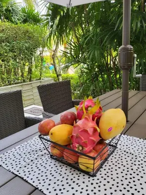 a basket of fruit sitting on a table at Naithon Beach Pearl of Naithon in Nai Thon Beach