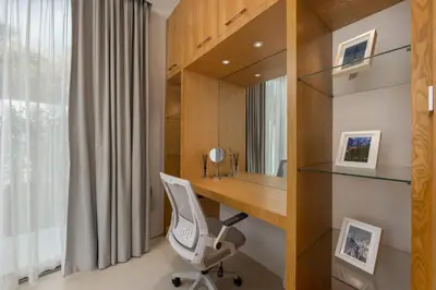 a home office with a desk and a chair at Taimana Luxury 3BR Private Pool Villa at LuxPride in Ban Phak Chit